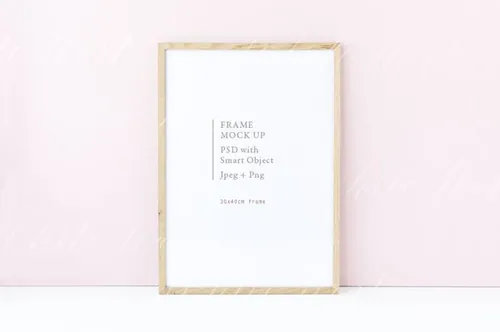 极简主义木质画框样机 Minimal wooden frame on pink bgd