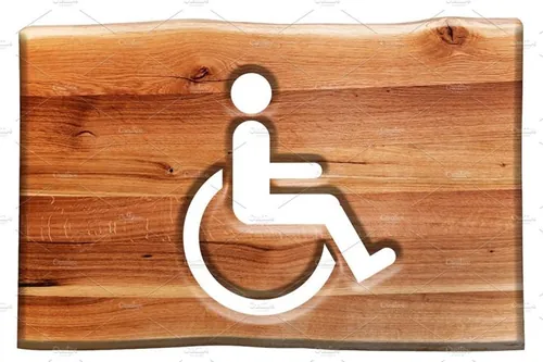 木头残疾人标志设计元素Man on wheelchair - sign in wood.
