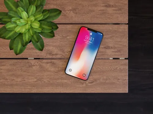 iPhoneX手机贴图样机PSD模板iPhone X On Table Mockup