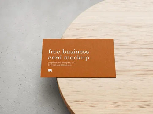 放在圆桌上的名片设计贴图样机模板 business cards mockup